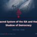 The Sacred System of the IEA and the Dark Shadow of Democracy